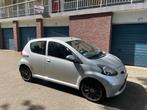 Toyota Aygo 1.0i 12V 5 Deurs met ijskoude Airco en PDC, Voorwielaandrijving, Stof, Handgeschakeld, Grijs