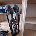 Houten Afrikaans beeld, Ophalen