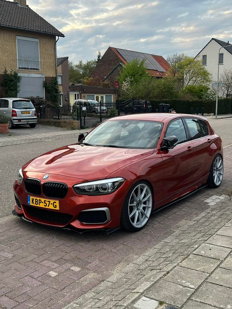 BMW 1-serie M140i 482pk handgeschakelt 2017 sunset orange, Achterwielaandrijving, Lichtsensor, Alcantara, Handgeschakeld
