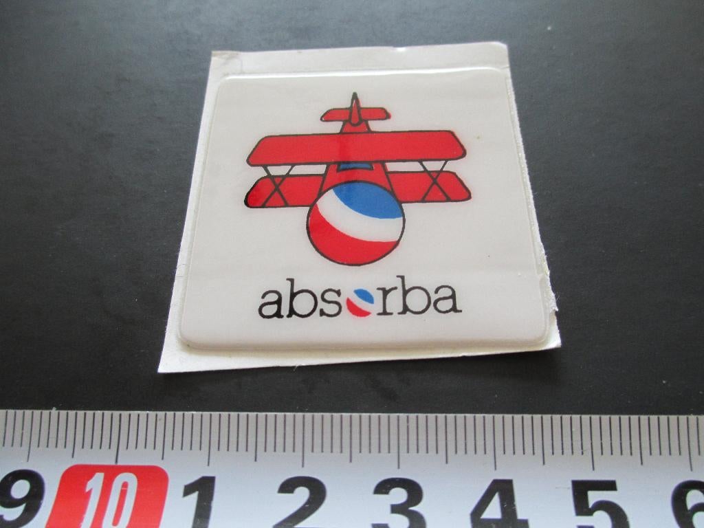 sticker schuimvinyl logo ABSORBA vliegtuig dubbeldekker, Ophalen, Zo goed als nieuw