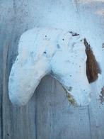 Betonnen paardenhoofd wanddecoratie, Ophalen