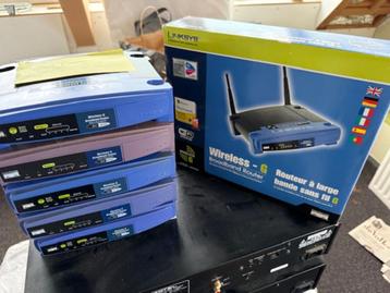 5x Linksys routers WRT54G + 2x Fritzbox beschikbaar voor biedingen