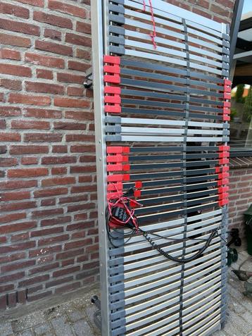 Elektrisch lattenbodem beschikbaar voor biedingen
