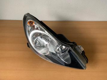 Koplamp Rechts Opel Corsa D 2006 tot 2010  zwart binnenwerk beschikbaar voor biedingen