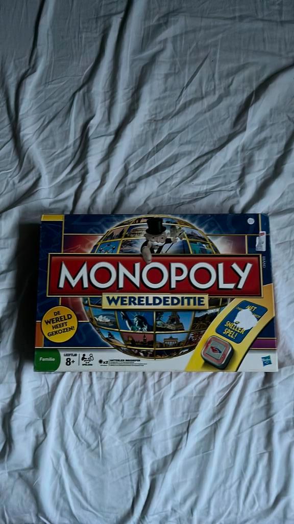 Monopoly Wereldeditie, Hobby en Vrije tijd, Gezelschapsspellen | Bordspellen, Zo goed als nieuw, Een of twee spelers, Drie of vier spelers