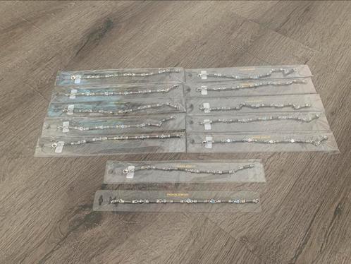 Partij 12 stuks armbandjes met blauw steentje A30, Sieraden, Tassen en Uiterlijk, Armbanden, Nieuw, Blauw, Ophalen of Verzenden
