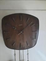 Wandklok met slinger en gewichten Junghans, Ophalen