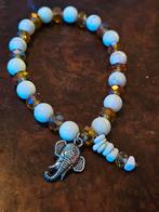 Armband met olifant bedel, Wit, Ophalen of Verzenden, Zo goed als nieuw, Elastiek