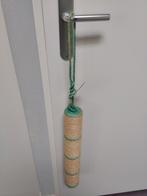 Krabpaal om op te hangen, Ophalen