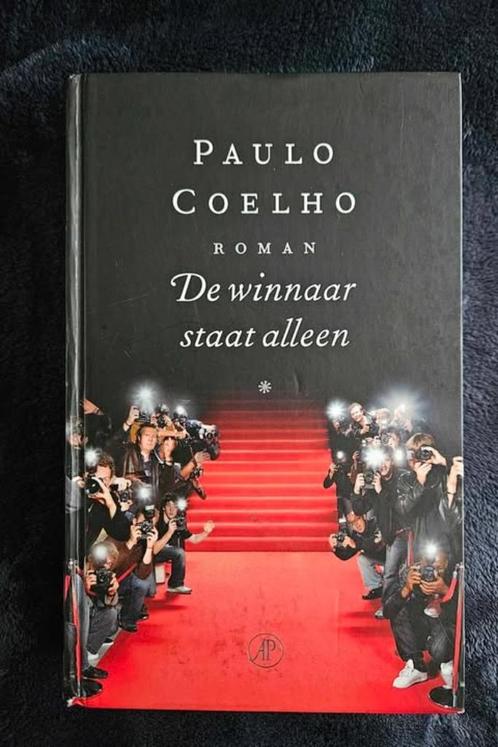 Paulo Coelho - De winnaar staat alleen, Boeken, Romans, Zo goed als nieuw, Ophalen of Verzenden