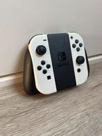 Joy-Con grip Nintendo Switch, Ophalen of Verzenden, Zo goed als nieuw, Switch, Overige controllers
