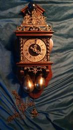 Mooie Zaanse Klok met Gewichten, Ophalen