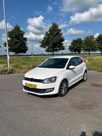 Volkswagen Polo 1.2 TSI Comfortline 2010 Wit, Auto's, Volkswagen, Voorwielaandrijving, Zwart, Elektrische buitenspiegels, 1198 cc