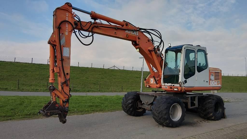 Atlas 1304 (bj1995) brede banden kenteken 1304 (bj 1995), Zakelijke goederen, Machines en Bouw | Kranen en Graafmachines, Graafmachine