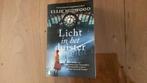 Ellie Midwood - Licht in het duister, Boeken, Ophalen of Verzenden, Zo goed als nieuw, Ellie Midwood