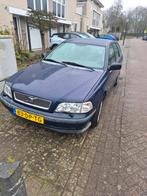 Volvo V40 1.8 AUT 1999 Blauw, Auto's, 1295 kg, 4 cilinders, Blauw, Leder en Stof