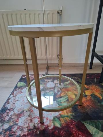 Mooi rond gouden tafeltje te koop beschikbaar voor biedingen