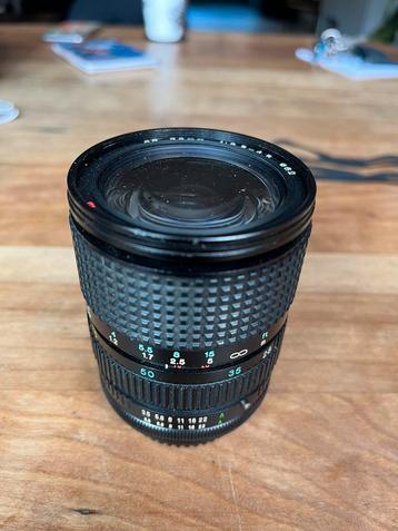 Tokina zoomlens 28 mm - 70 mm f/3.5 -4.5 beschikbaar voor biedingen