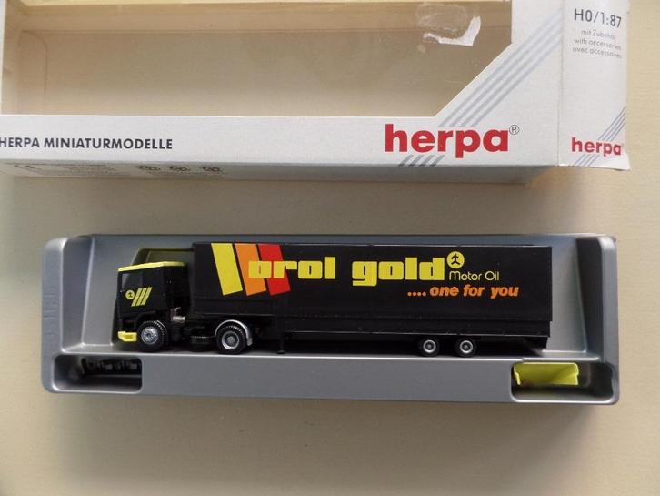 DAF trekker / oplegger  Orol Gold Herpa, Hobby en Vrije tijd, Modelauto's | 1:87, Nieuw, Bus of Vrachtwagen, Herpa, Verzenden