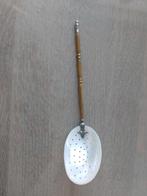 Te koop  parelmoeren suikerlepel. Met messing handvat., Antiek en Kunst, Antiek | Goud en Zilver, Ophalen of Verzenden