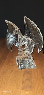 Glazen draak, Ophalen