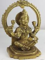 Beeld, mooi standbeeld Shri Laxmi ,, Ophalen