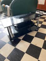 Zwarte glazen salontafel op wielen, Huis en Inrichting, Tafels | Salontafels, Ophalen, Gebruikt, 100 tot 150 cm, 50 tot 100 cm