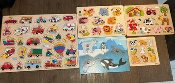 Houten kinderpuzzels beschikbaar voor biedingen