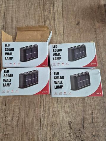 8x LED lamp up/down met zonnepaneeltje beschikbaar voor biedingen