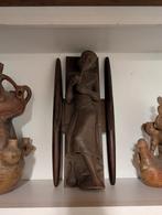 Handgemaakt Houten Beeld, Ophalen