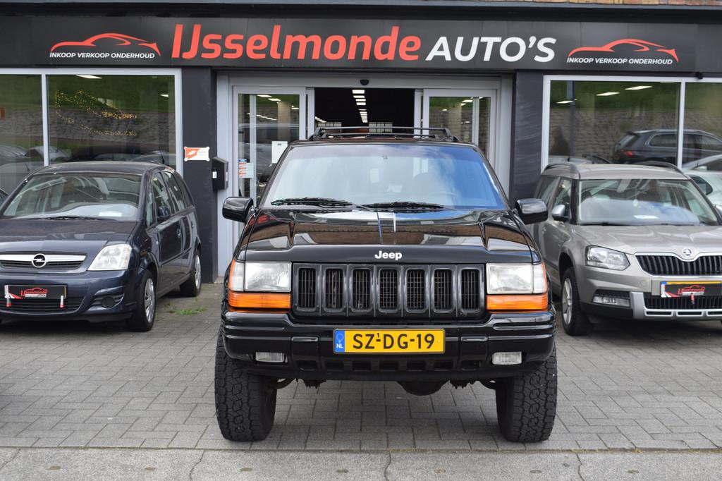 Jeep Grand Cherokee 5.2i V8 Limited Automaat (bj 1997), Zwart, Leder, Bedrijf, Vierwielaandrijving