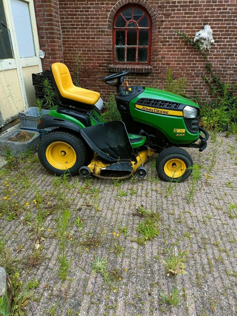 John Deere X105 zitmaaier, Ophalen
