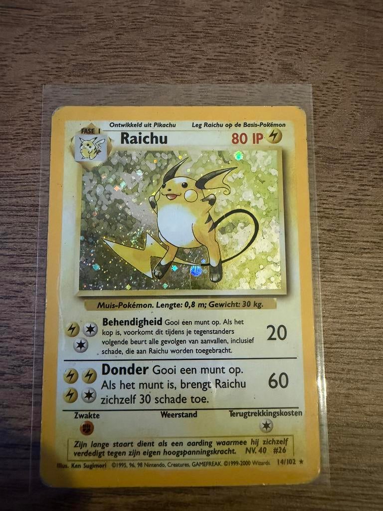 Pokemon base set raichu NL HOLO 14/102, Ophalen of Verzenden, Gebruikt, Foil