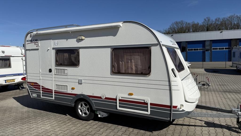Home-Car Racer 43 TMF bouwjaar 2005 met (zak)luifel, Caravans en Kamperen, Caravans, Home-car, Bedrijf, Treinzit, 750 - 1000 kg
