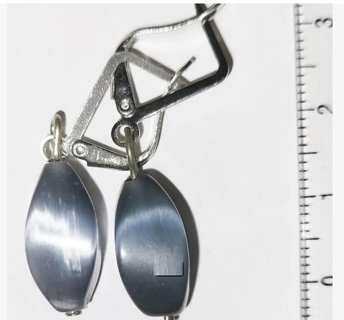 Kattenoog Armbanden en oorbellen van een verzameling stene, Ophalen of Verzenden, Nieuw, Overige materialen