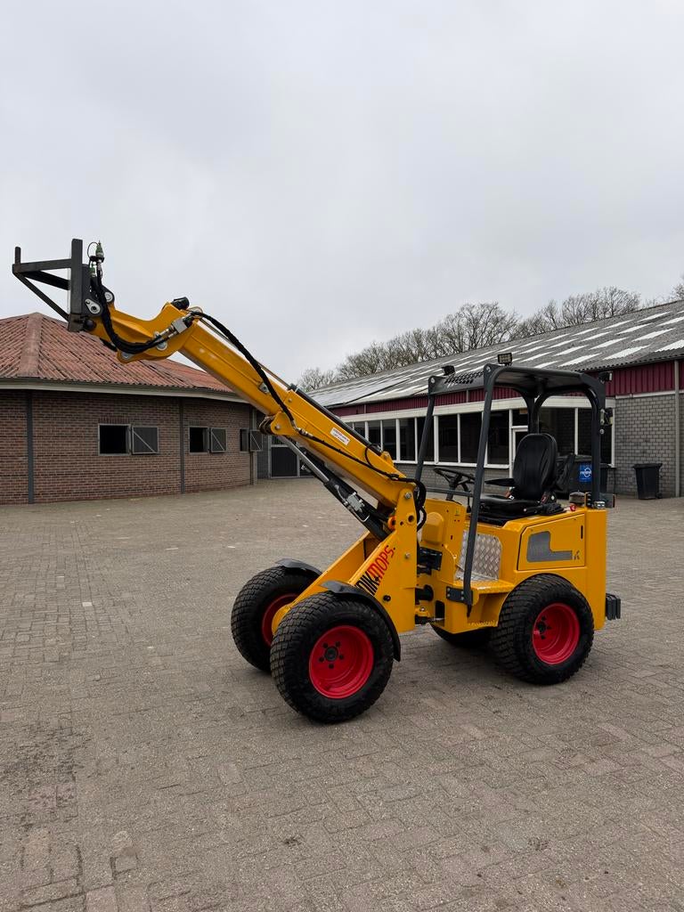 Knikmops 130 Tele in nieuwstaat met aanbouwdelen, Ophalen of Verzenden, Wiellader of Shovel