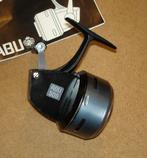 vintage reel ABU 506 + boekje, Ophalen, Gebruikt, Molen