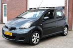 Toyota Aygo 1.0 12V Aspiration Green Navigator - AIRCO - NAV, Voorwielaandrijving, Euro 5, Gebruikt, Metallic lak