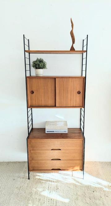 Midcentury vintage wandkast WHB design beschikbaar voor biedingen