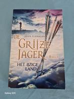 John Flanagan - Het ijzige land, Boeken, John Flanagan, Ophalen of Verzenden, Zo goed als nieuw