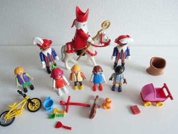 Playmobil Sinterklaas, roetveegpieten, kinderen en speelgoed beschikbaar voor biedingen