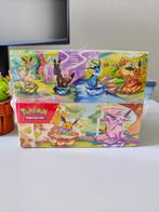 Prismatic Evolutions Tin Display Sealed 8 stuks New ETB Box, Ophalen of Verzenden, Nieuw, Boosterbox, Foil