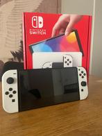 Nintendo Switch OLED, Spelcomputers en Games, Spelcomputers | Nintendo Switch, Ophalen of Verzenden, Zo goed als nieuw, Met 2 controllers
