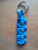 Stoere sleutelhanger met blinkende moeren. van Paracord., Ophalen of Verzenden, Nieuw, Overige typen