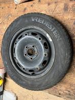 Stalen velg met winterbanden, Ophalen