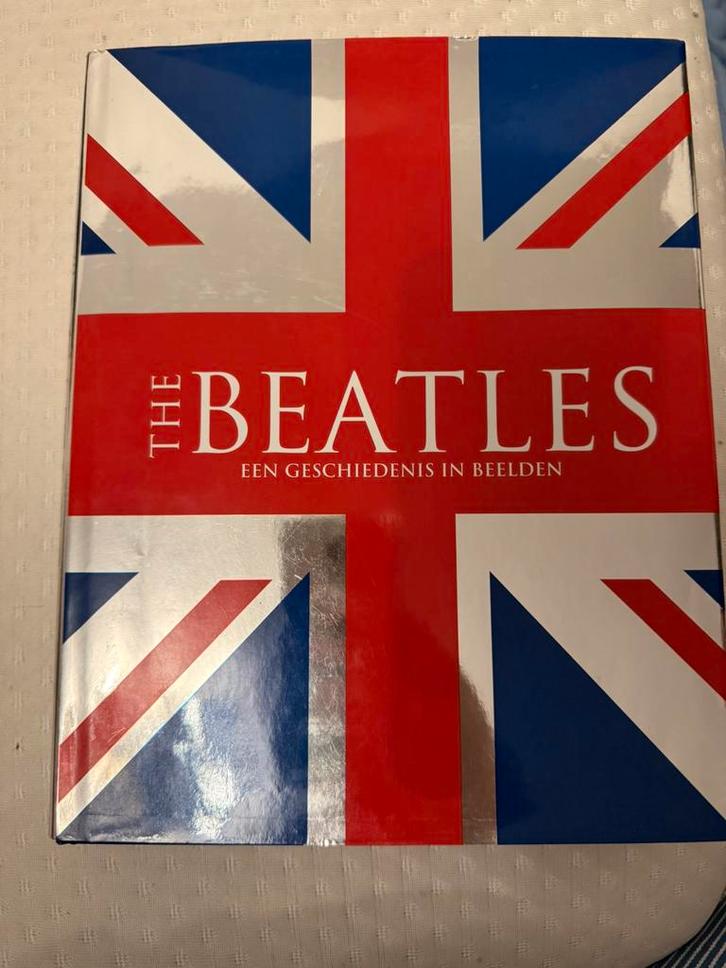 The Beatles - Een geschiedenis in beelden, Antiek en Kunst, Antiek | Boeken en Bijbels, Ophalen of Verzenden