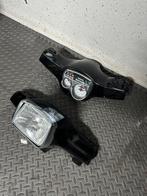 Vespa s stuurkappen claxonneus, Ophalen