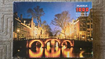 Puzzel: 1000 stukjes - Amsterdamse grachten beschikbaar voor biedingen