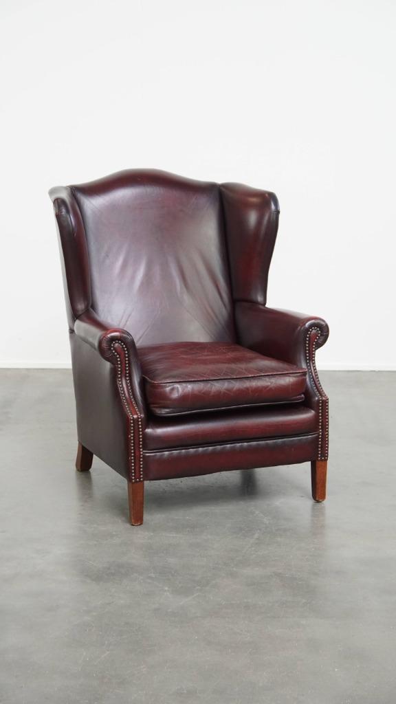Leuke bordeauxrode rundleren oorfauteuil in Engelse stijl, Huis en Inrichting, Fauteuils, Gebruikt, 75 tot 100 cm, 75 tot 100 cm
