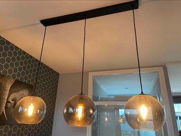 Drie glazen bollen met rookgas (gekocht bij Rietveld)
